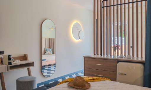 Modern room with elegant decor and mirrors.